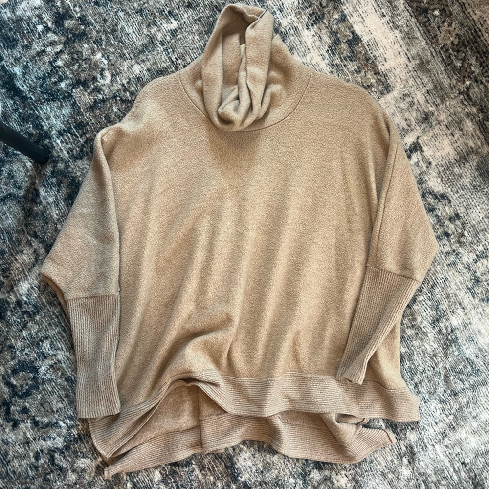 Beige turtleneck sweater/cape